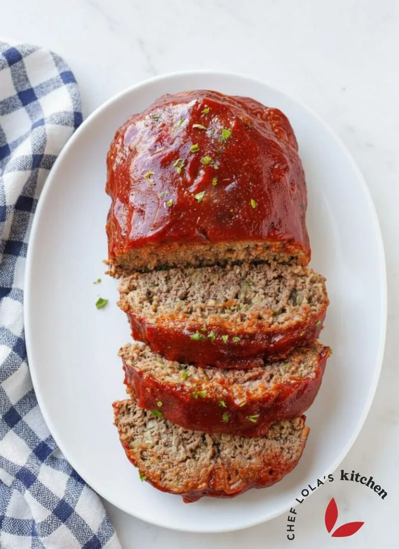 Juicy classic meatloaf topped with sweet and tangy tomato glaze