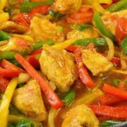 Chicken stir fry with colorful vegetables in flavorful sauce
