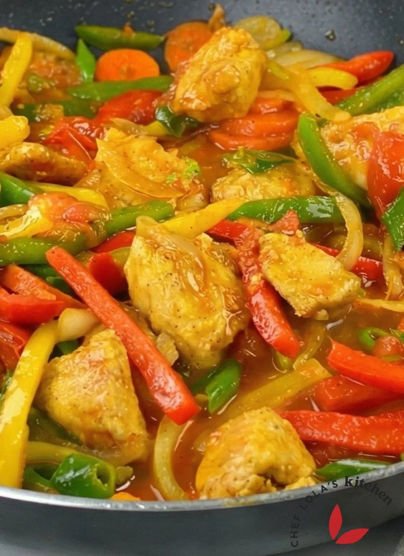 Chicken stir fry with colorful vegetables in flavorful sauce