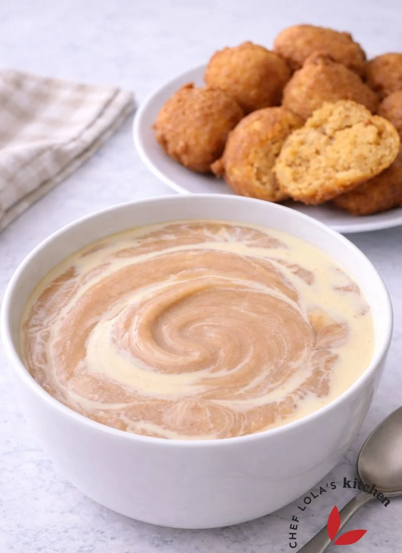 Breakfast setup with a bowl of Ogi (pap) and Akara