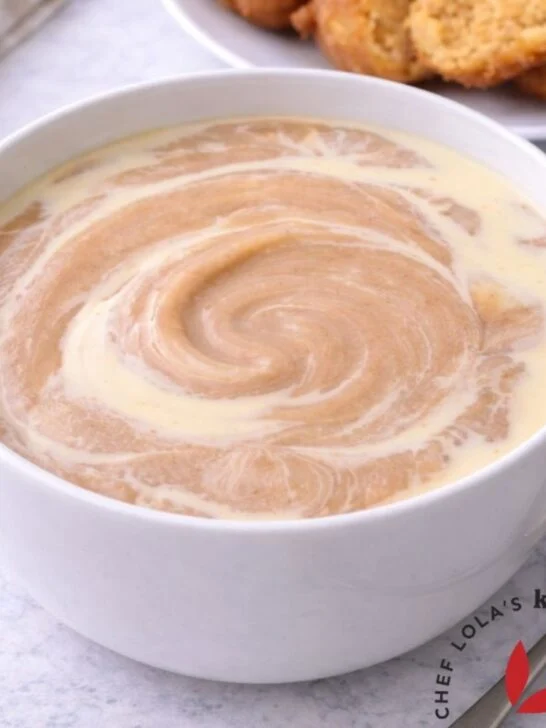 Traditional fermented corn pap in a white ceramic bowl, ready to eat.
