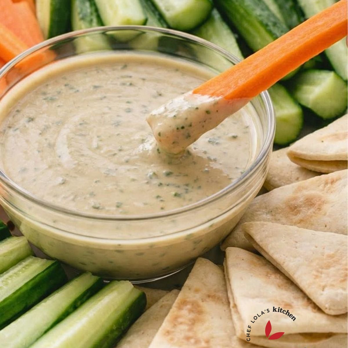 Creamy tahini dip, sesame paste, lemon juice, and garlic.