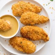 Crispy baked Chicken Tenders served with dipping sauce